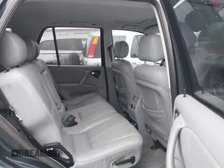 2002 Mercedes-Benz M 320/430/500 z VIN 4JGAB54E72A296354, wystawiony jako IAAI lot #41277897 z przebiegiem 101 842 mil mil oraz . Historia ofert i sprzedaży dostępna na DreamBid. Obrazek 8.