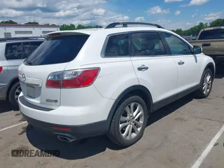 2012 Mazda CX-9 Grand Touring with VIN JM3TB2DA0C0360225, listed as a IAAI auction lot 42181667 with 195,306 mi miles and . Bid and sale history available at DreamBid. Image 4.