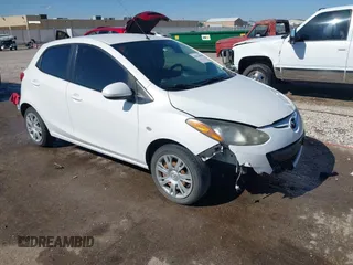 2014 Mazda 2 Sport with VIN JM1DE1KY0E0175562, listed as a IAAI auction lot 42023803 with 247,411 mi miles and . Bid and sale history available at carsss.com. Image 1.