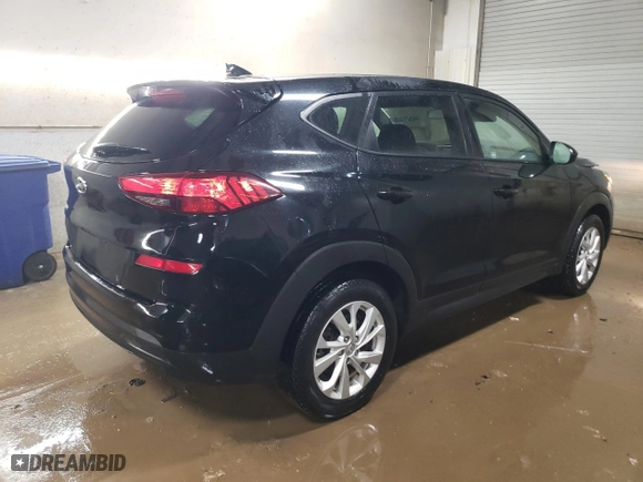 2019 Hyundai Tucson SE with VIN KM8J23A43KU868793, listed as a Copart auction lot 44521105 with 100,856 mi miles and Salvage Title. Bid and sale history available at carsss.com. Image 3.
