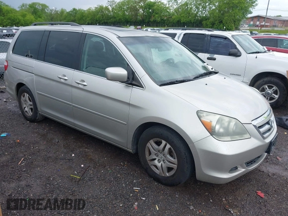 2007 Honda Odyssey EX-L with VIN 5FNRL38787B455417, listed as a IAAI auction lot 42104303 with 214,482 mi miles and . Bid and sale history available at DreamBid. Image 1.