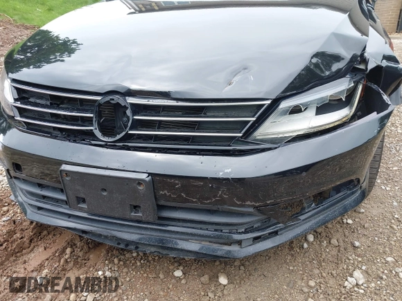 2017 Volkswagen Jetta S z VIN 3VW2B7AJ3HM303198, wystawiony jako IAAI lot #42651056 z przebiegiem 126 253 mil mil oraz . Historia ofert i sprzedaży dostępna na DreamBid. Obrazek 19.