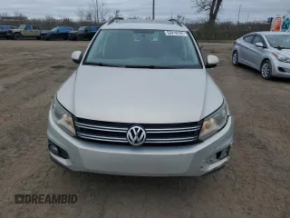 2013 Volkswagen Tiguan S with VIN WVGJV3AX0DW561431, listed as a Copart auction lot 55918795 with 246,907 mi miles and Salvage title. Bid and sale history available at DreamBid. Image 5.