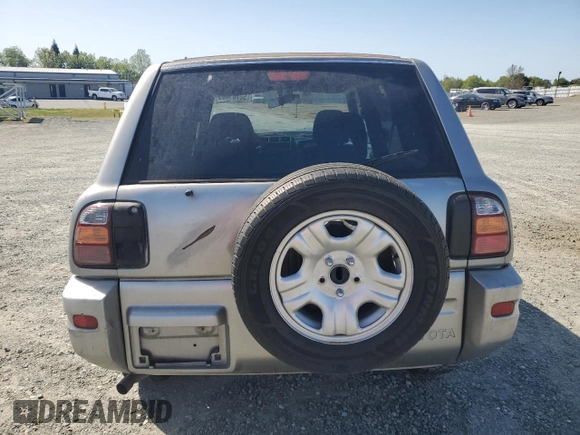 1999 Toyota RAV4 with VIN JT3GP10V5X7053634, listed as a Copart auction lot 52761695 with 236,443 mi miles and Salvage title. Bid and sale history available at DreamBid. Image 6.