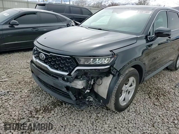 2021 Kia Sorento LX z VIN 5XYRG4LC7MG006894, wystawiony jako Copart lot #51697305 z przebiegiem 99 284 mil mil oraz Szkoda całkowita • Salvage title. Historia ofert i sprzedaży dostępna na DreamBid. Obrazek 11.