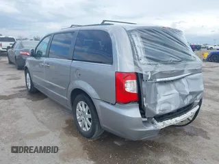 2016 Chrysler Town & Country Touring with VIN 2C4RC1BG0GR213058, listed as a IAAI auction lot 41910462 with 125,013 mi miles and . Bid and sale history available at DreamBid. Image 3.