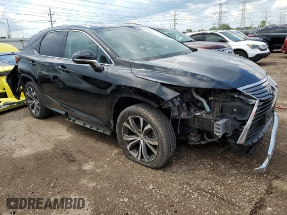 2017 Lexus RX 350 with VIN 2T2BZMCA3HC090428, listed as a Copart auction lot 61234685 with 83,933 mi miles and Salvage title. Bid and sale history available at DreamBid. Image 4.