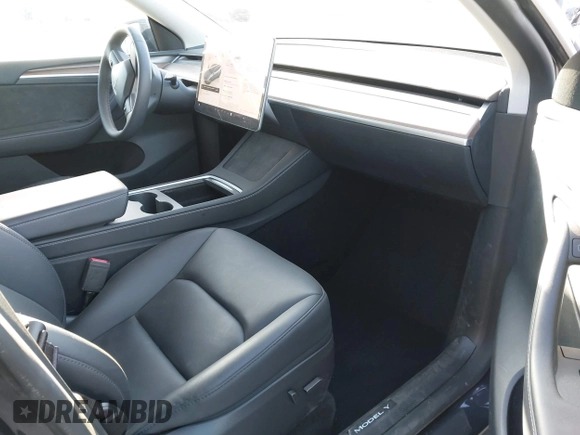2024 Tesla Model Y with VIN 7SAYGDED5RF103983, listed as a IAAI auction lot 41933836 with 11,398 mi miles and . Bid and sale history available at DreamBid. Image 5.