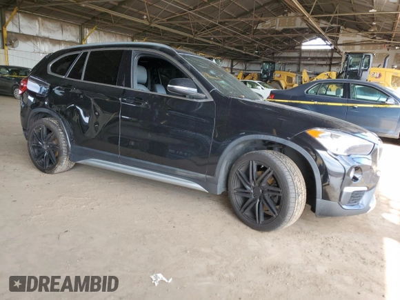 2018 BMW X1 sDrive28i with VIN WBXHU7C34J5L05725, listed as a Copart auction lot 49228475 with 69,994 mi miles and Salvage Title. Bid and sale history available at carsss.com. Image 4.