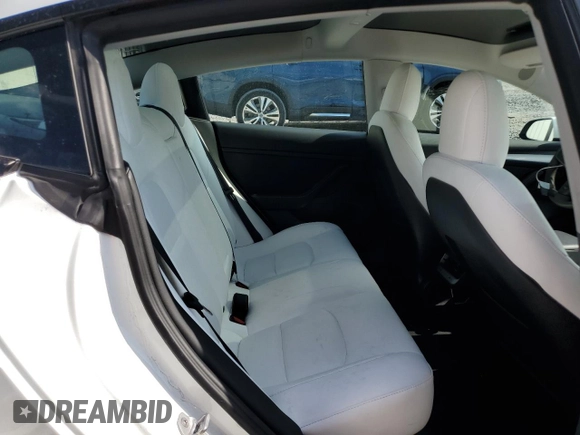 2023 Tesla Model 3 z VIN 5YJ3E1EAXPF422956, wystawiony jako Copart lot #52500285 z przebiegiem 24 082 mil mil oraz Nie do naprawy • Non repairable. Historia ofert i sprzedaży dostępna na DreamBid. Obrazek 10.