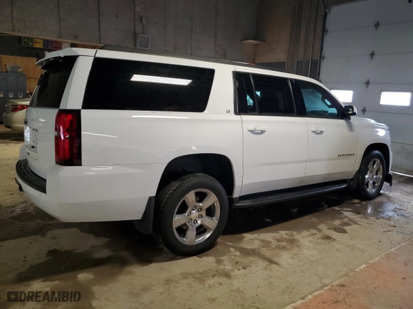 2020 Chevrolet Suburban LT with VIN 1GNSKHKC2LR187449, listed as a Copart auction lot 45943195 with 100,559 mi miles and Salvage Title. Bid and sale history available at carsss.com. Image 3.