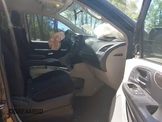 2014 Dodge Grand Caravan SXT with VIN 2C4RDGCG2ER313531, listed as a IAAI auction lot 42221726 with 177,065 mi miles and . Bid and sale history available at DreamBid. Image 5.