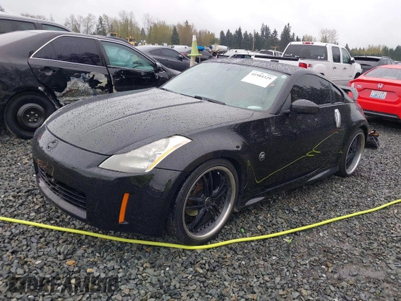 2003 Nissan 350Z Touring with VIN JN1AZ34EX3T013345, listed as a IAAI auction lot 41984329 with 102,115 mi miles. Bid and sale history available at carsss.com. Image 17.