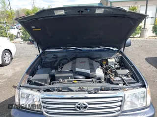 2003 Toyota Land Cruiser z VIN JTEHT05J932041288, wystawiony jako IAAI lot #42000615 z przebiegiem 166 159 mil mil oraz . Historia ofert i sprzedaży dostępna na DreamBid. Obrazek 10.