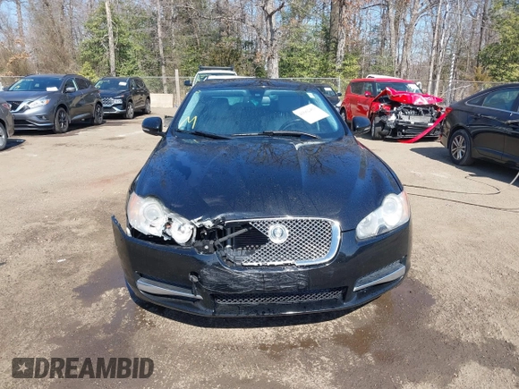 2011 Jaguar XF with VIN SAJWA0FB7BLS01476, listed as a IAAI auction lot 41662462 with 128,048 mi miles. Bid and sale history available at carsss.com. Image 12.