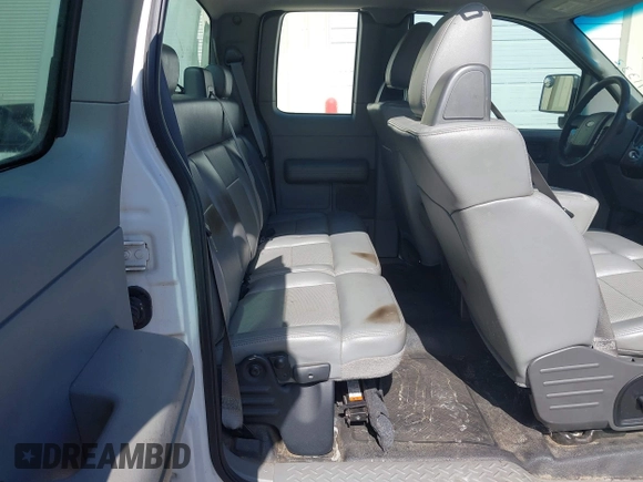 2007 Ford F-150 STX with VIN 1FTRX12W47FA49512, listed as a IAAI auction lot 42771332 with 203,687 mi miles and . Bid and sale history available at DreamBid. Image 8.