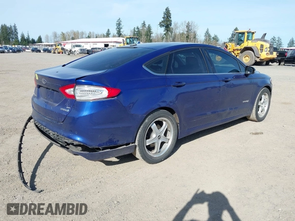 2014 Ford Fusion SE Hybrid with VIN 3FA6P0LU7ER293753, listed as a IAAI auction lot 41968592 with 173,895 mi miles and . Bid and sale history available at DreamBid. Image 4.