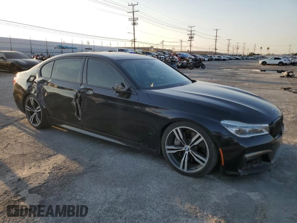 2017 BMW 7 Series 750i with VIN WBA7F0C57HGM21136, listed as a Copart auction lot 88525335 with 102,508 mi miles and Salvage title. Bid and sale history available at DreamBid. Image 4.