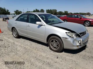 2002 Toyota Camry LE z VIN 4T1BE32KX2U037722, wystawiony jako Copart lot #58482805 z przebiegiem 154 207 mil mil oraz Szkoda całkowita • Salvage title. Historia ofert i sprzedaży dostępna na DreamBid. Obrazek 4.