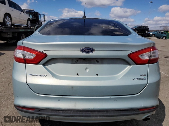 2013 Ford Fusion SE Hybrid with VIN 3FA6P0LU9DR191305, listed as a Copart auction lot 50213775 with 132,939 mi miles and Salvage Title. Bid and sale history available at DreamBid. Image 6.