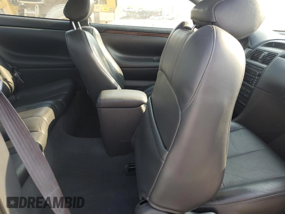 2000 Toyota Solara SE z VIN 2T1CF28P5YC267645, wystawiony jako Copart lot #60543605 z przebiegiem 58 938 mil mil oraz Szkoda całkowita • Salvage title. Historia ofert i sprzedaży dostępna na DreamBid. Obrazek 10.