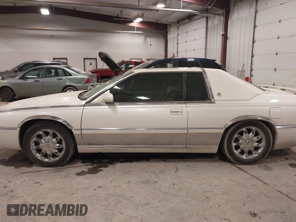 2002 Cadillac Eldorado ESC with VIN 1G6EL12Y82B102890, listed as a IAAI auction lot 41511915 with 79,116 mi miles. Bid and sale history available at carsss.com. Image 14.
