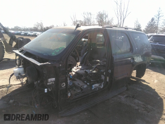 2013 Chevrolet Tahoe LT with VIN 1GNSKBE01DR316300, listed as a IAAI auction lot 41865589 with Not Provided miles and . Bid and sale history available at DreamBid. Image 2.