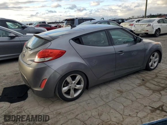 2014 Hyundai Veloster RE:FLEX z VIN KMHTC6AD2EU216453, wystawiony jako Copart lot #87090324 z przebiegiem 147 771 mil mil oraz Czysty tytuł • Clean title. Historia ofert i sprzedaży dostępna na DreamBid. Obrazek 3.
