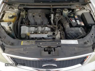 2005 Ford Five Hundred SE z VIN 1FAFP231X5G165841, wystawiony jako Copart lot #43117535 z przebiegiem 154 874 mil mil oraz Czysty tytuł • Clean title. Historia ofert i sprzedaży dostępna na DreamBid. Obrazek 11.