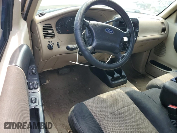 2003 Ford Ranger XL Fleet z VIN 1FTZR45E13PB20412, wystawiony jako Copart lot #60357605 z przebiegiem 190 398 mil mil oraz Czysty tytuł • Clean title. Historia ofert i sprzedaży dostępna na DreamBid. Obrazek 8.