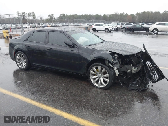 2015 Chrysler 300 C with VIN 2C3CCAEG8FH786879, listed as a IAAI auction lot 41563321 with 130,060 mi miles and . Bid and sale history available at carsss.com. Image 1.
