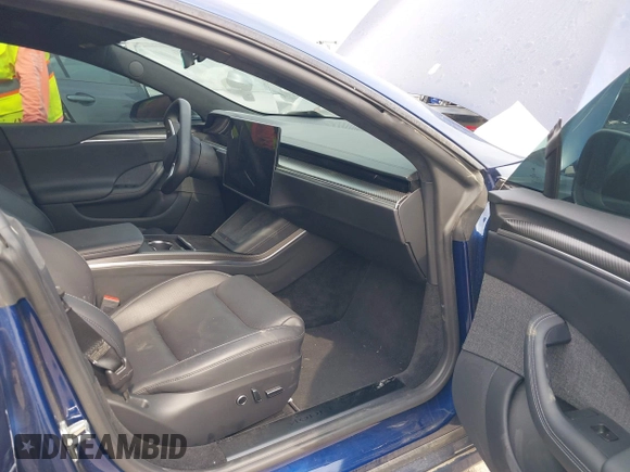 2021 Tesla Model S Plaid with VIN 5YJSA1E64MF442036, listed as a IAAI auction lot 42141304 with 24,998 mi miles and . Bid and sale history available at DreamBid. Image 5.