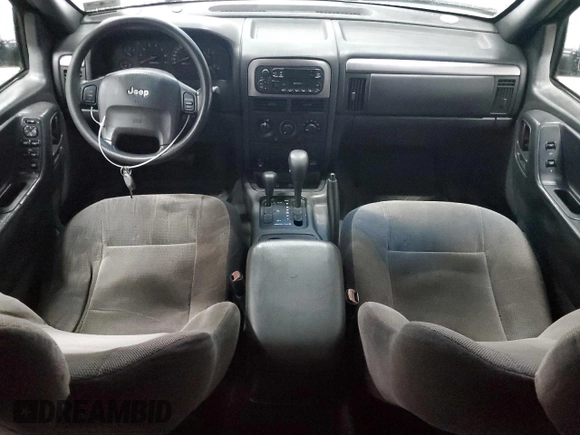 2001 Jeep Grand Cherokee Laredo with VIN 1J4GW48S11C618478, listed as a Copart auction lot 57889965 with Not provided miles and Clean title. Bid and sale history available at DreamBid. Image 8.