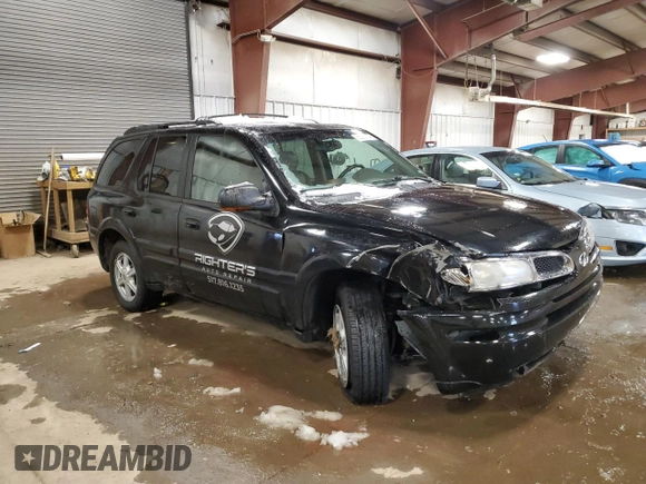 2002 Oldsmobile Bravada z VIN 1GHDT13S522107056, wystawiony jako Copart lot #86296454 z przebiegiem 169 856 mil mil oraz Tytuł czysty. Historia ofert i sprzedaży dostępna na DreamBid. Obrazek 4.