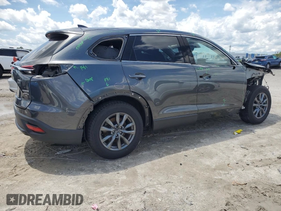 2020 Mazda CX-9 Touring с VIN JM3TCACY2L0414453, выставлен на аукционе Copart как лот 63451845 с пробегом 65 380 миль миль и Списание • Salvage title. История ставок и продаж доступна на DreamBid. Изображение 3.