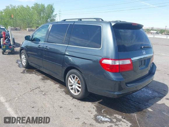 2005 Honda Odyssey TOURING with VIN 5FNRL38855B091754, listed as a IAAI auction lot 42131326 with 258,635 mi miles. Bid and sale history available at carsss.com. Image 3.