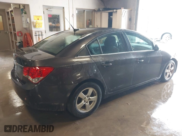 2014 Chevrolet Cruze 1LT with VIN 1G1PC5SBXE7477219, listed as a IAAI auction lot 41970786 with 194,542 mi miles and . Bid and sale history available at DreamBid. Image 4.