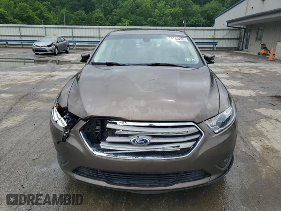 2015 Ford Taurus SEL z VIN 1FAHP2E84FG102075, wystawiony jako Copart lot #59740265 z przebiegiem 90 669 mil mil oraz Szkoda całkowita • Salvage title. Historia ofert i sprzedaży dostępna na DreamBid. Obrazek 5.