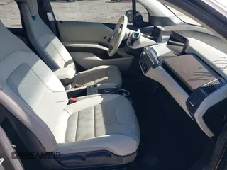 2017 BMW i3 z VIN WBY1Z8C55HV550906, wystawiony jako IAAI lot #41705056 z przebiegiem 79 566 mil mil oraz . Historia ofert i sprzedaży dostępna na DreamBid. Obrazek 5.