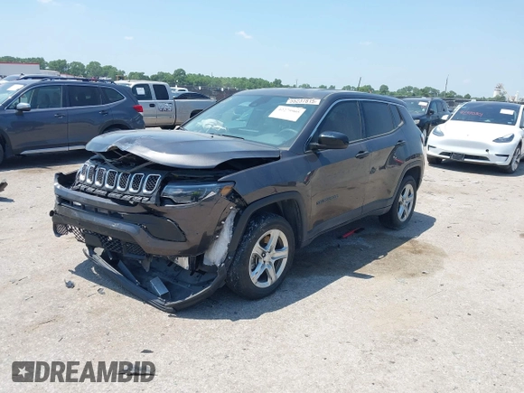2023 Jeep Compass Sport with VIN 3C4NJDAN3PT515463, listed as a IAAI auction lot 42279905 with 15,339 mi miles and . Bid and sale history available at DreamBid. Image 2.