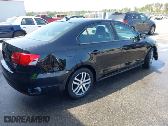 2011 Volkswagen Jetta Sedan SE w/Convenience & Sunroof with VIN 3VWDX7AJ5BM354817, listed as a IAAI auction lot 41919430 with 156,284 mi miles. Bid and sale history available at carsss.com. Image 4.
