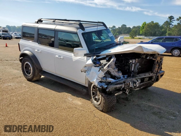 2023 Ford Bronco with VIN 1FMEE5DP4PLA96702, listed as a Copart auction lot 57574165 with 9,258 mi miles and Salvage title. Bid and sale history available at DreamBid. Image 4.