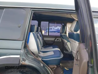 1995 Mitsubishi Montero z VIN JA4MR41H7SJ010597, wystawiony jako IAAI lot #41610885 z przebiegiem 162 406 mil mil oraz . Historia ofert i sprzedaży dostępna na DreamBid. Obrazek 8.