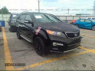 2012 Kia Sorento SX with VIN 5XYKW4A25CG292659, listed as a IAAI auction lot 32893622 with Not provided miles and . Bid and sale history available at DreamBid. Image 1.