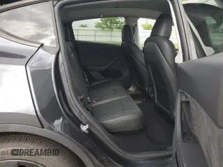 2024 Tesla Model Y с VIN 7SAYGDED4RA329638, выставлен на аукционе Copart как лот 54562525 с пробегом 8 606 миль миль и Списание • Salvage title. История ставок и продаж доступна на DreamBid. Изображение 10.