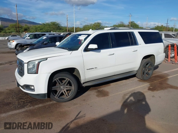2015 GMC Yukon XL SLT with VIN 1GKS1HKC2FR612690, listed as a IAAI auction lot 41234188 with 113,830 mi miles. Bid and sale history available at carsss.com. Image 17.
