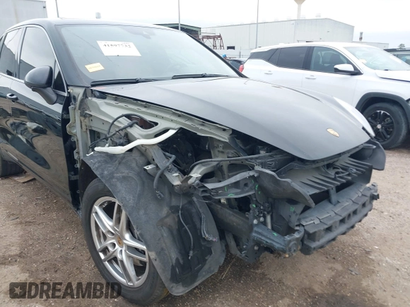 2014 Porsche Cayenne with VIN WP1AA2A21ELA92673, listed as a IAAI auction lot 41597732 with 140,673 mi miles and . Bid and sale history available at DreamBid. Image 6.