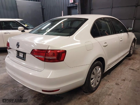 2015 Volkswagen Jetta Sedan 2.0L S with VIN 3VW2K7AJ5FM287843, listed as a IAAI auction lot 41273524 with 94,558 mi miles. Bid and sale history available at carsss.com. Image 4.