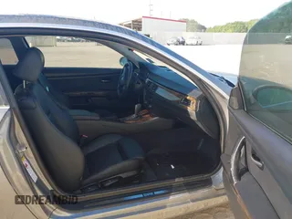 2007 BMW 3 Series 328i with VIN WBAWV13547P117295, listed as a IAAI auction lot 42020390 with 143,657 mi miles and . Bid and sale history available at DreamBid. Image 5.