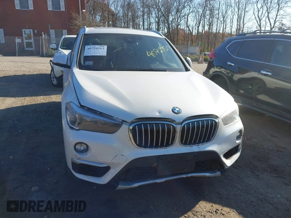 2019 BMW X1 xDrive28i with VIN WBXHT3C57K5L89697, listed as a IAAI auction lot 40729513 with 46,319 mi miles and . Bid and sale history available at DreamBid. Image 12.